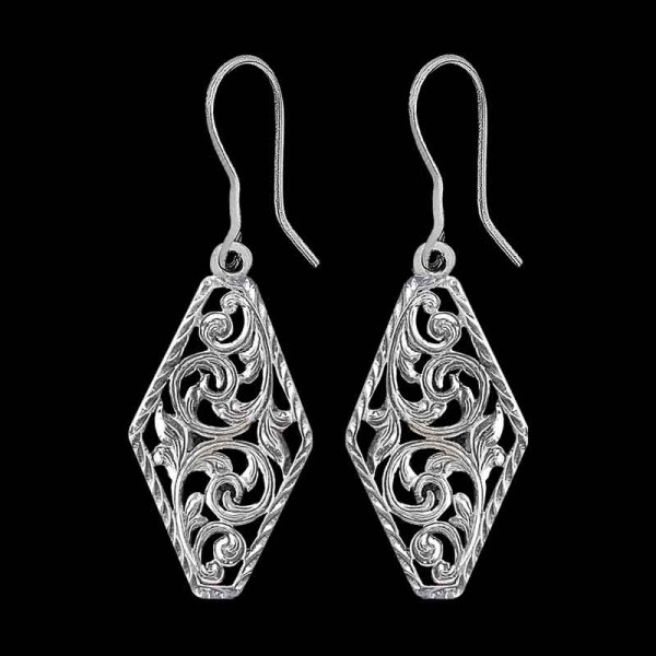 Wear the essence of American Beauty with this hand-crafted set of earrings. Built with the finest German Silver and detailed with immaculate scrollwork. Detailed with our signature antique finish to add a rustic feel.

Click Cow Tags and Western Cuff Br